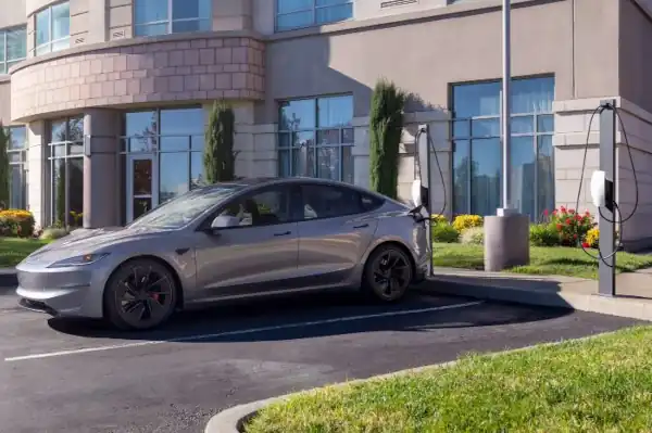 An electrician installing a car charger in a home in Georgia.