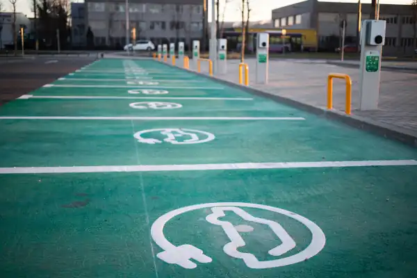 An electrician installing a car charger in a home in Georgia.
