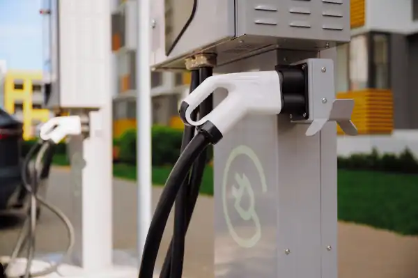 An electrician installing a car charger in a home in Georgia.