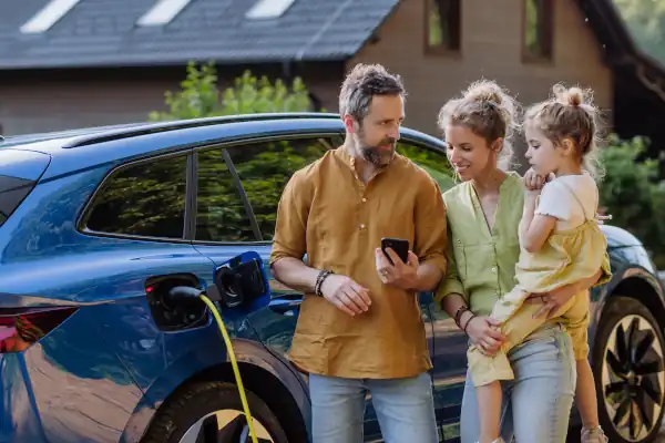 An electrician installing a car charger in a home in Georgia.