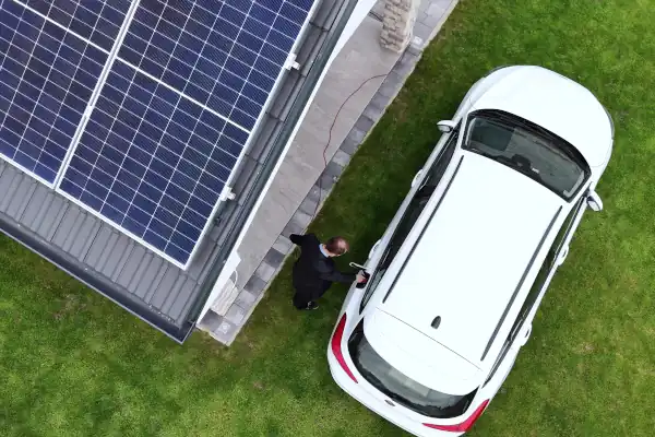 An electrician installing a car charger in a home in Georgia.