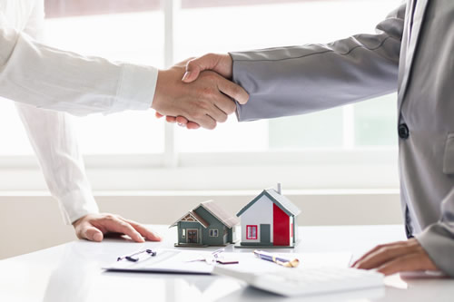 An electrician installing a car charger in a home in Georgia.