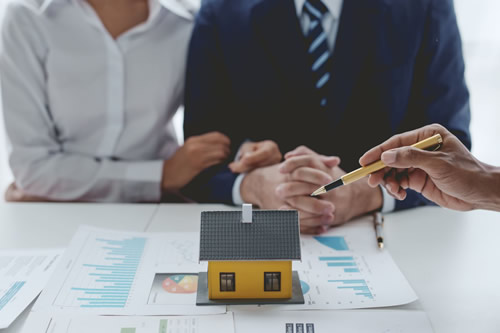 An electrician installing a car charger in a home in Georgia.