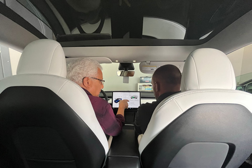 An electrician installing a car charger in a home in Georgia.